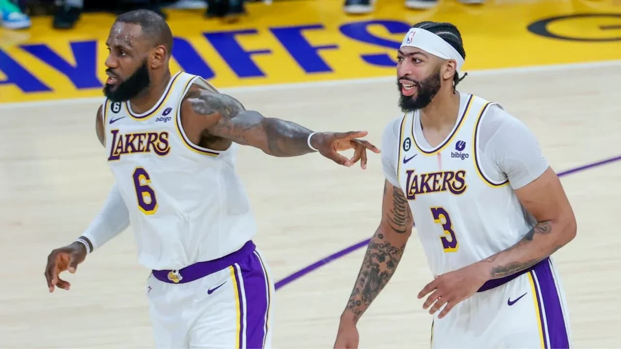 LeBron James and Anthony Davis celebrating on court LeBron James and Anthony Davis celebrating on court