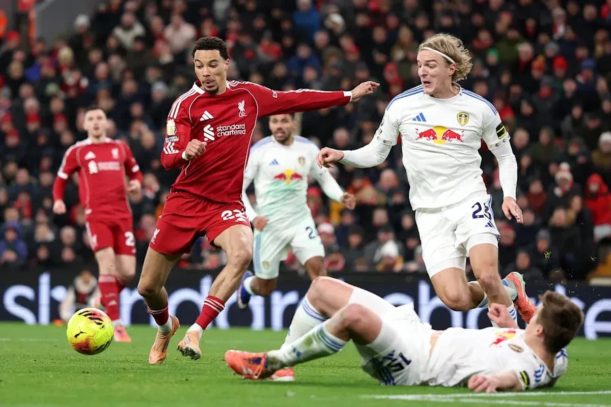 Liverpool and Leeds players in action during match Liverpool and Leeds players in action during match