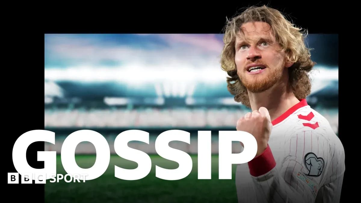 Fist-pumping player celebrating on stadium field Fist-pumping player celebrating on stadium field