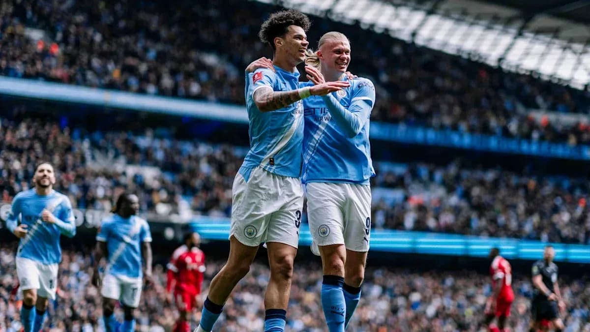 Manchester City players celebrating a goal in stadium Manchester City players celebrating a goal in stadium