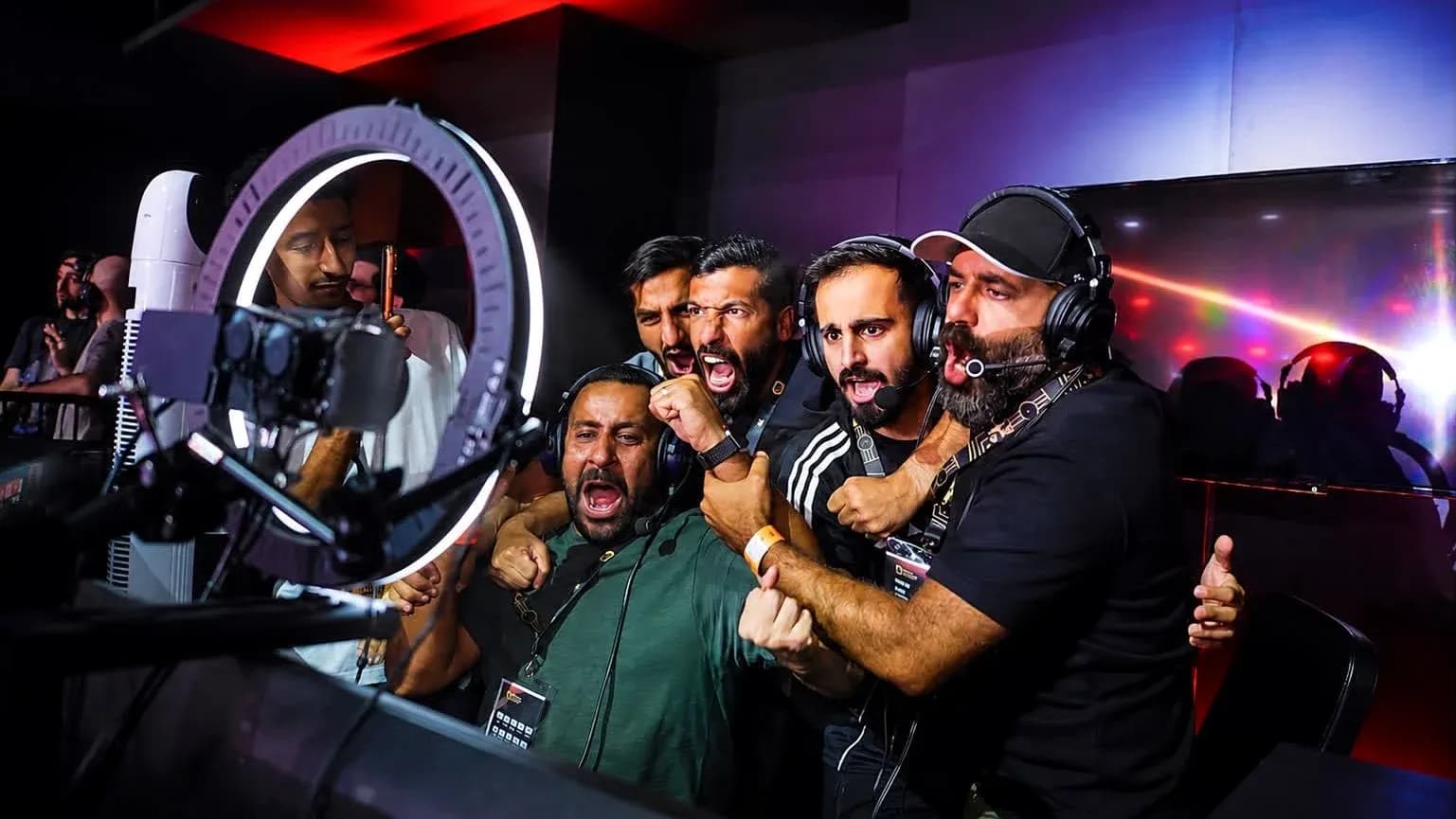 Commentators celebrating during esports event broadcast Commentators celebrating during esports event broadcast