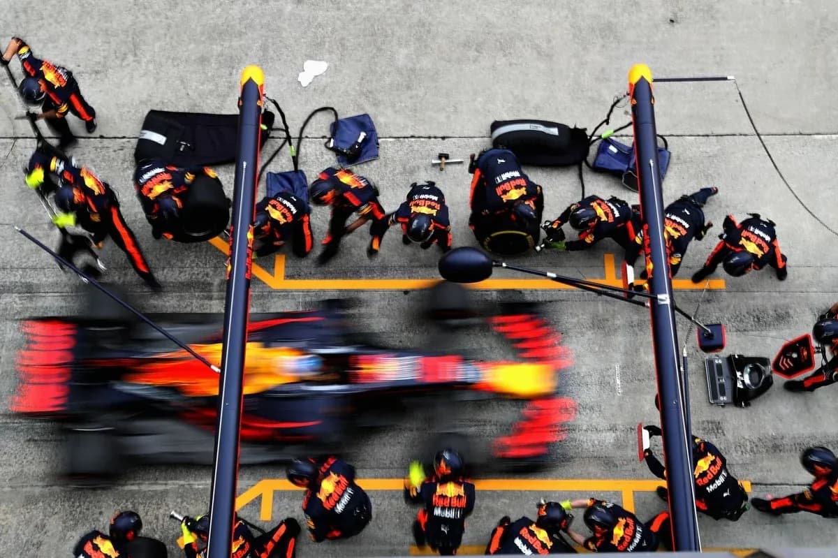 Red Bull Racing pit crew during a pit stop Red Bull Racing pit crew during a pit stop