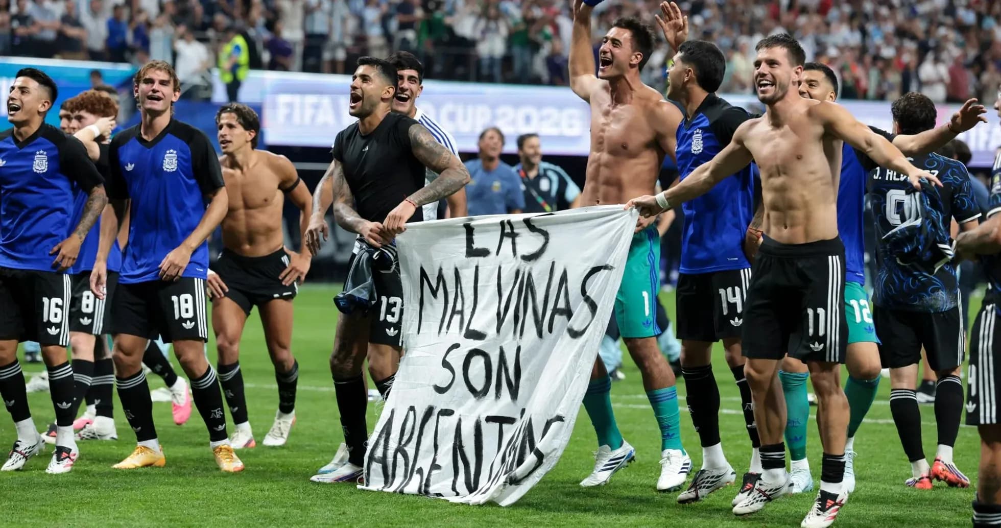 Argentine players celebrating with banner after match Argentine players celebrating with banner after match